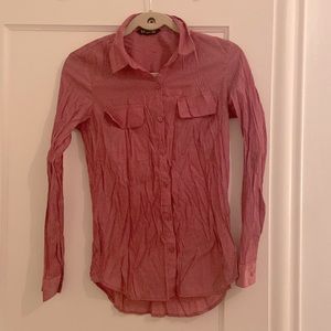 Red button down with small white polka dots